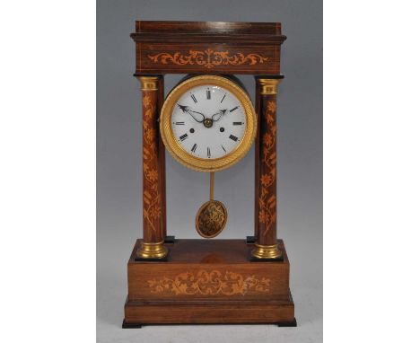 A late 19th century French rosewood and marquetry inlaid portico clock, having unsigned white enamel Roman dial within a chas