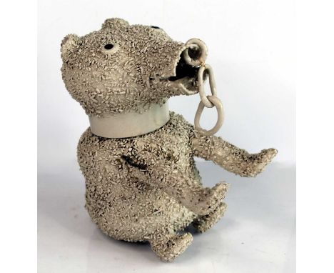 A George III salt-glazed white stoneware 'Bear-baiting' jug, probably Staffordshire, typically modelled sitting on its haunch