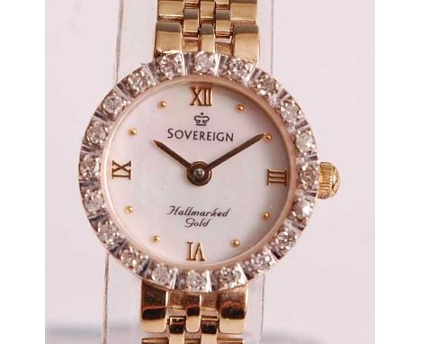 A 9ct yellow gold lady's Sovereign diamond set quartz dress watch, having a round mother of pearl quarter Roman dial and oute