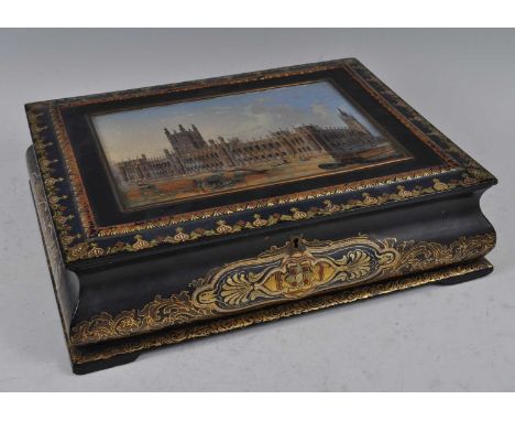 A Victorian papier-mâché table box, the hinged cover centrally decorated with the Houses of Parliament, the whole with polych