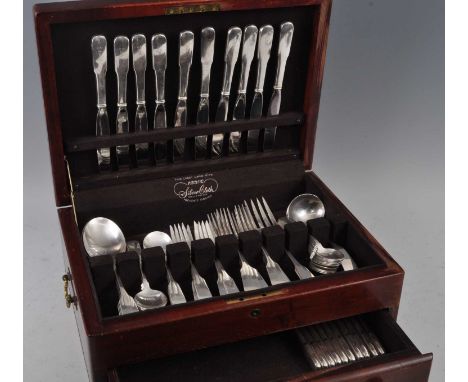 A Gorham American sterling silver part cutlery suite in fitted canteen, in the Fiddle pattern, comprising three serving spoon