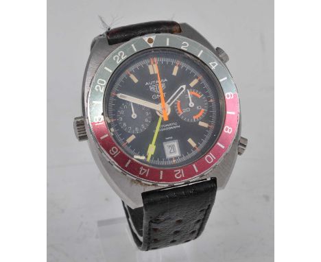 A gent's stainless steel Heuer Autavia GMT automatic chronograph wristwatch, circa 1970s, having a signed black dial, twin su