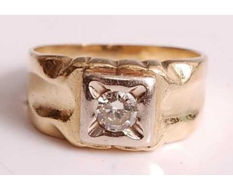 A yellow and white metal diamond solitaire ring, featuring a round brilliant cut diamond in a white square setting with textu