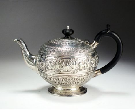 A Victorian silver teapot, John Septimus Beresford, London 1878, of circular form with embossed panel decoration depicting si