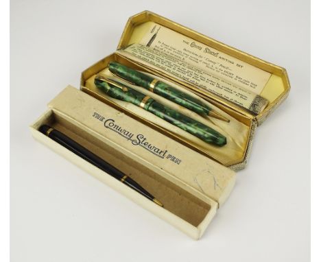 The Conway Stewart writing set, comprising; Conway Stewart 84 fountain pen with 14ct gold nib and a matching pencil, within o