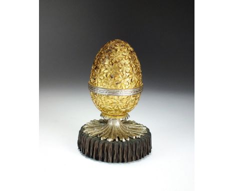 A silver and gilt surprise clock-work musical Easter egg, Christopher Nigel Lawrence, London 1982, limited edition 16/250, th