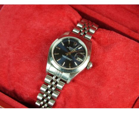 A Lady's stainless steel Rolex Oyster Perpetual Date Superlative Chronometer bracelet wristwatch, the blue dial with batons a