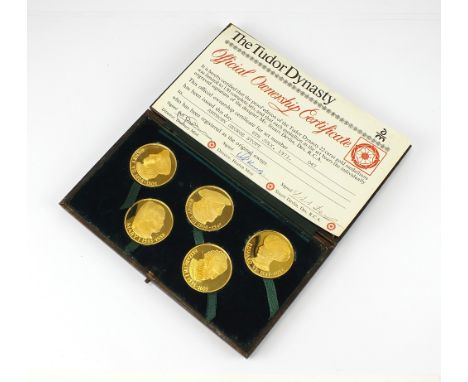 A cased set of five proof 22ct gold medallions, 'The Tudor Dynasty', each weigh 31g, diameter 35mm, designed by Stuart Devlin