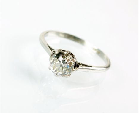 A single stone diamond ring, the old cut diamond claw set in white metal to white metal shank, stamped 'Plat', ring size M 1/