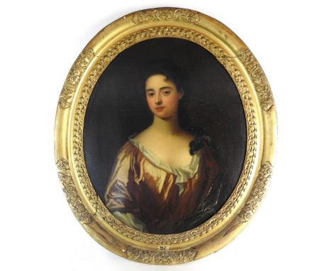 Circle of Enoch Seeman (Danzig c.1694-1744 london) Portrait of a lady, half length wearing a light brown dress with a white f