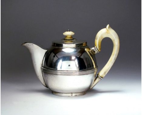 A 19th century German silver teapot, Frankfurt, circa 1880, of circular form with reeded band to the waist and turned ivory h