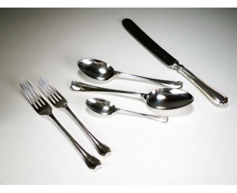 A set of silver flatware, George Edward & Sons, Sheffield 1913, comprising; twelve tablespoons, eleven dessert spoons, seven 