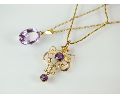 An early 20th century amethyst set openwork pendant, stamped to the reverse '9ct', suspended from 9ct gold box link chain, to
