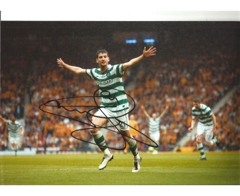 Charlie Mulgrew Celtic Signed 12 x 8 inch football photo. Supplied from stock of www.sportsignings.com the in person Sport au