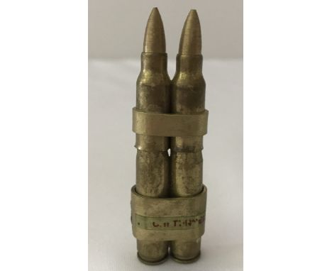 Vietnam War Era Trench Art lighter made from 2 M16 bullets.  Approx. 7cm tall.