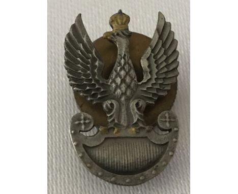 A WW2 style Polish Army lapel pin badge.  Approx. 2.5cm x 1cm.