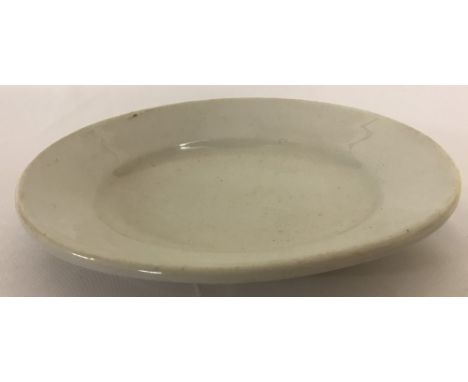 A German WW2 style Waffen SS oval shaped, heavy ceramic plate possibly for gravy boat or sauce dish.  Approx. 20.5cm x 14cm