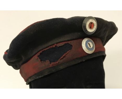 WW1 style Feldmutze Forage cap, complete with metal button badges. In worn condition. Interior stamped Bavi 1915. 