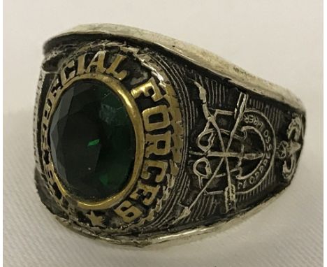 Vietnam War style Special Forces ring with central oval green stone.  Ring size Z.