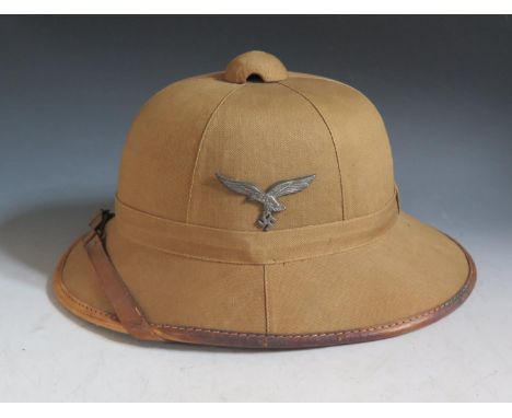 A WWII German Afrika Corps Pith Helmet, interior stamped in ink cnv43 55 