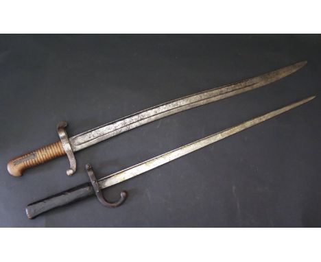 A French Model 1842 Yataghan Sword Bayonet with brass grip for the Model 1840 Percussion Carbine (69cm) and one other Packing