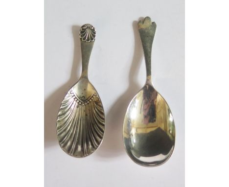 An Edward VII Silver Caddy Spoon with scalloped bowl Sheffield 1903 W.H and one other Sheffield 1959 FH, 26.8g 