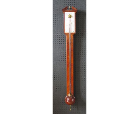 A Rare Stick Barometer by George Adams _ The silvered brass scale calibrated from 27" to 31" with weather indications and a s