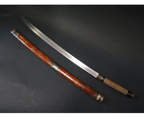 An Antique Asian Sword with shagreen and silver mounts and bamboo scabbard, blade 57.5, 76cm overall length Packing only serv