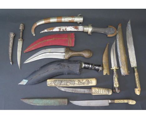 Eight Sheath Knives / Daggers including Japanese tanto in bone scabbard, kukri, jambiya etc. 