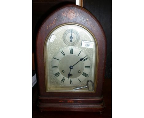 Edwardian inlaid mahogany arch-topped bracket-type mantle clock with chining 8-day German movement striking on a gong