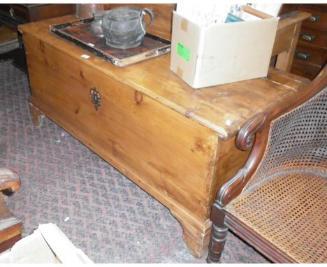 Large 19th c. stripped pine blanket box on bracket feet, 56" long
