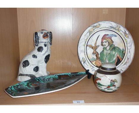 Poole Pottery Delphis shaped dish, a Staffordshire dog, ginger jar and Royal Doulton plate "The Falconer"