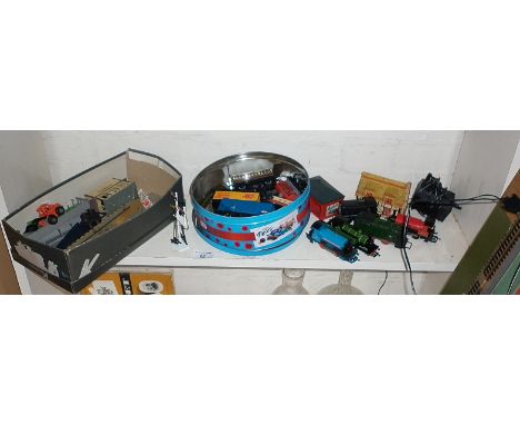 Model train layout with five locos and rolling stock and accessories
