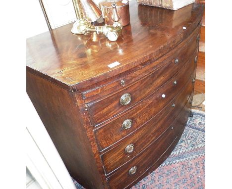 Georgian mahogany bow front chest of drawers with brushing slide standing on splayed bracket feet, 40" wide x 36" high x 24" 