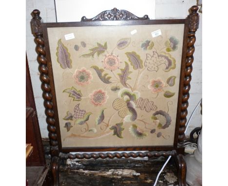 Woolwork firescreen in oak frame with barley-twist supports