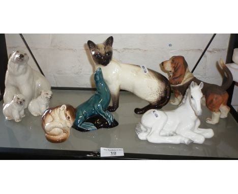 Beswick china Siamese cat, a Branksome china polar bear with cubs, a USSR china horse and two Poole Pottery animals