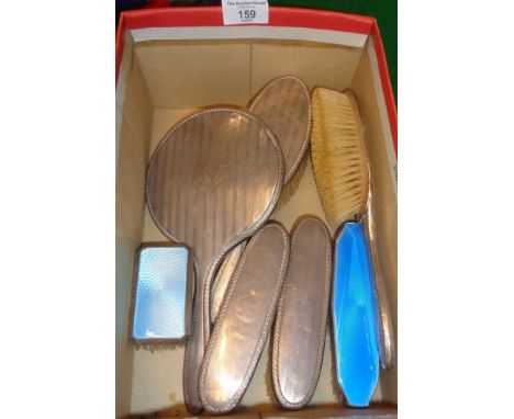 Four piece Sterling silver vanity brush with mirror set, together with another two guilloche enamel and silver brushes