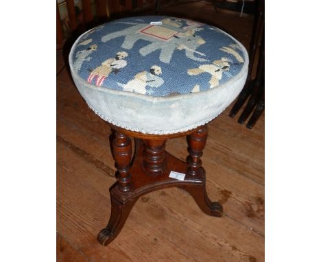 Victorian mahogany revolving piano stool with tapestry seat