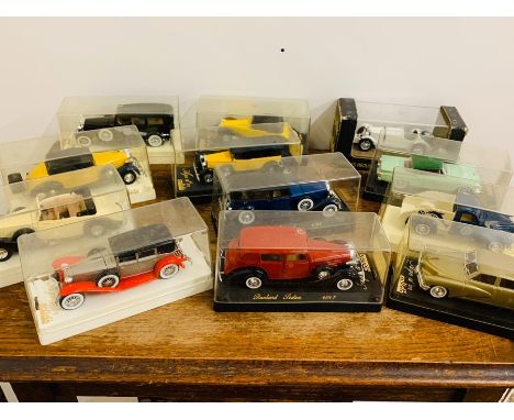Twelve Solido boxed diecast model cars 