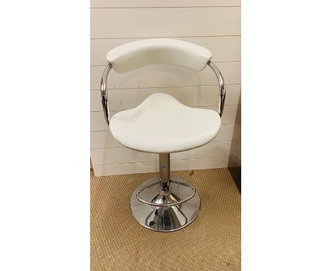 An adjustable contemporary white bar stool