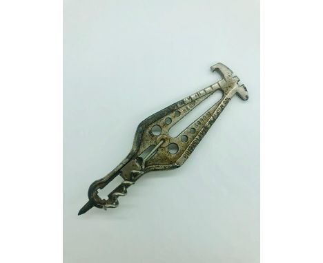 A 1922 UM multi tool corkscrew.