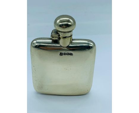 A silver hip flask, London hallmark, maker's mark JDWD.