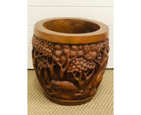 An African hardwood carved planter (31cm tall)