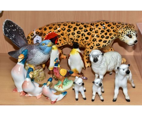 A GROUP OF BESWICK ANIMAL AND BIRD FIGURES, comprising a Leopard model no 1082, height 12.5cm x length 31cm, a Cuckoo no 2315