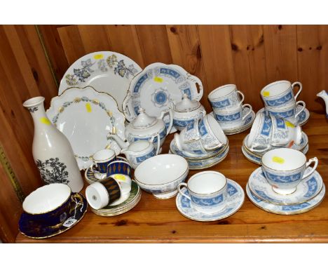 A COALPORT 'REVELRY' PATTERN TEA SET, together with a Coalport cobalt blue and gold 'Cairo' pattern tea cup and saucer, a lim