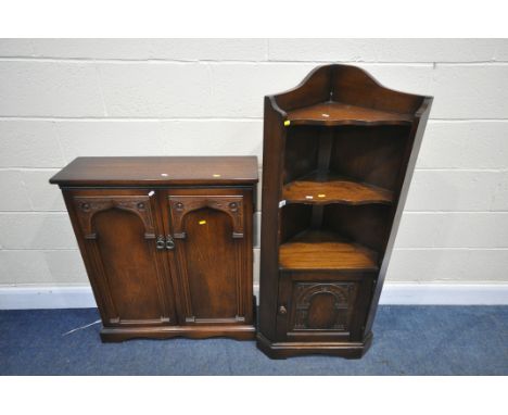 AN OAK TWO DOOR CD CABINET,  and an oak open corner unit above a single cupboard door (condition:-corner cupboard with surfac