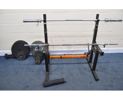 A MIRAFIT ADJUSTABLE SQUAT/BENCH RACK, along with an Olympic weight bar, another weight bar, two pairs of bar clips, four hou