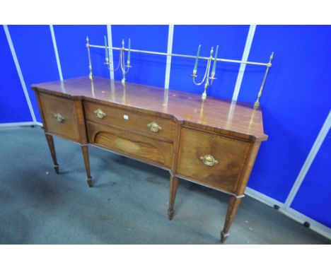 A 20TH CENTURY GEROGIAN STYLE MAHOGANY AND CROSSBANDED SIDEBAORD, with a later brass tubular gallery with two pairs of candel