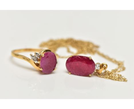 A RUBY RING AND PENDANT, the pendant set with an oval cut ruby accented with a single round brilliant diamond, leading on to 