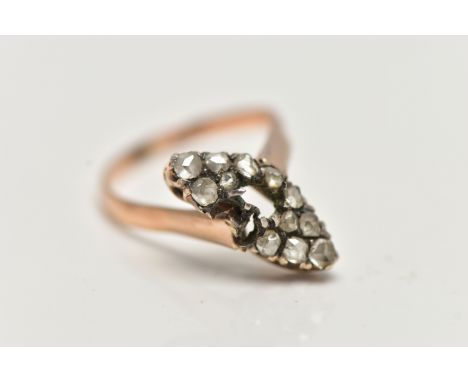 A YELLOW METAL DIAMOND RING, (AF) distorted ring, yellow and white metal set with twelve rose cut diamonds, three stones miss